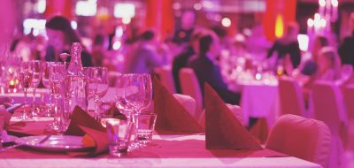 banquet-dinner-pink-lights-people-2024-11-26-03-48-58-utc